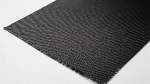 Flat sheet of carbon fibre cloth prepared for resin infusion and composite fabrication projects