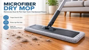 Microfiber dry mop removing dust, pet hair, and fine debris from a hardwood floor