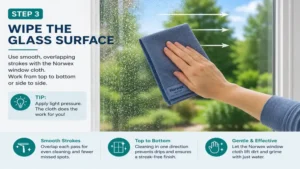 How to use norwex window cloth while wiping a large glass surface with smooth overlapping strokes.